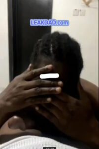 Shy African babe suck dick while covering the camera