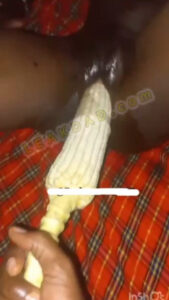 Naija babe uses corn in her pussy as she masturbate hard