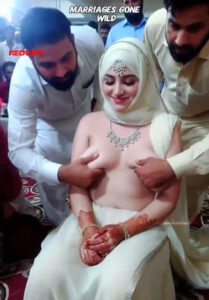 Indian bride allows men touch her breast during traditional marriage