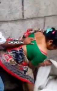Indian woman collects quick doggy duck from passersby